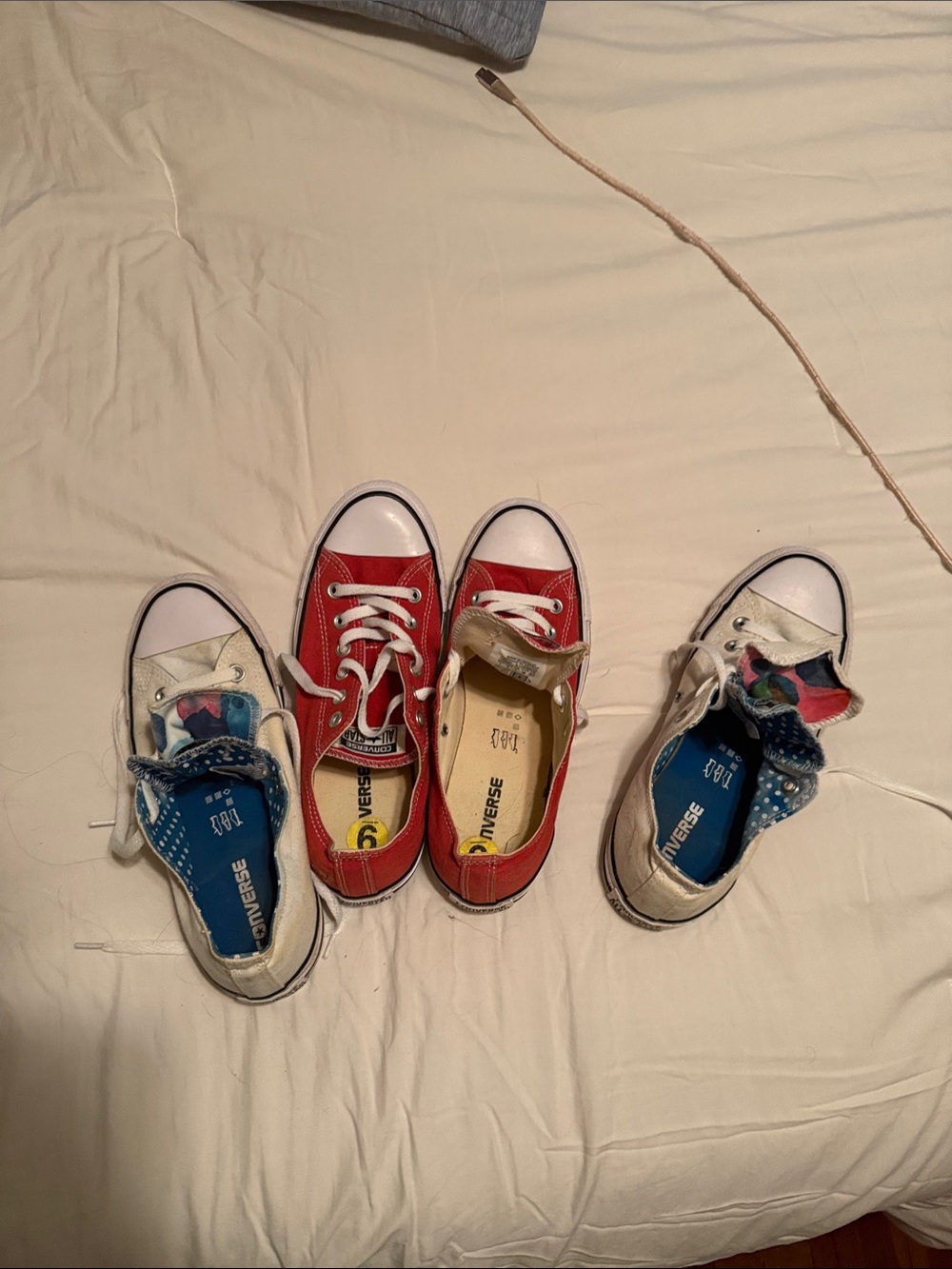 Converse women’s 
 Low Top Canvas Sneakers in Red and White